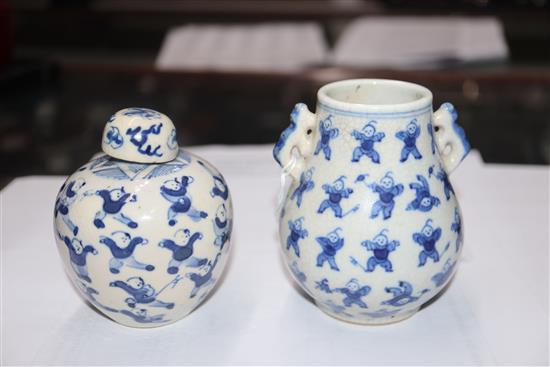 Two Chinese blue and white hundred boys vases, larger 8cm.